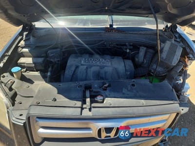 Zdjęcie 11 z 13 samochodu: 2006 HONDA PILOT EX VIN:5FNYF28576B001251 - miniatura