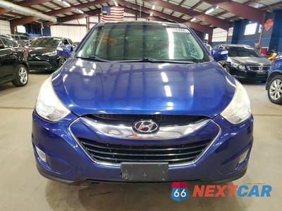 Piąte zdjęcie samochodu w środku: 2012 HYUNDAI TUCSON LIMITED VIN:KM8JUCAC5CU436936 - miniatura