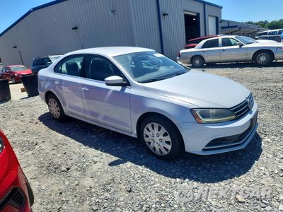 Czwarte zdjęcie samochodu z boku: 2017 VOLKSWAGEN JETTA S VIN:3VW2B7AJ0HM279944 - miniatura