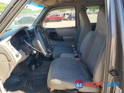 Zdjęcie 7 z 12 samochodu: 1999 FORD RANGER SUPER CAB VIN:1FTYR14V2XPB95041 - miniatura
