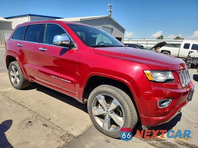 Czwarte zdjęcie samochodu z boku: 2015 JEEP GRAND CHEROKEE OVERLAND VIN:1C4RJFCM3FC916443 - miniatura