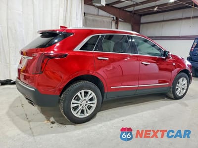 Trzecie zdjęcie samochodu z tyłu: 2022 CADILLAC XT5 LUXURY VIN:1GYKNBR4XNZ102950 - miniatura