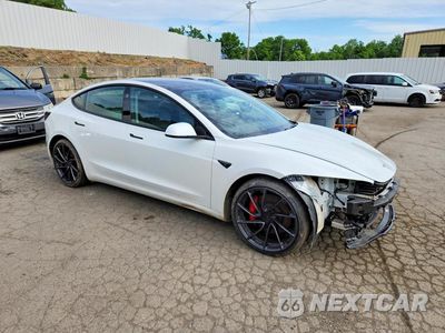 Czwarte zdjęcie samochodu z boku: 2024 TESLA MODEL 3 VIN:5YJ3E1ET1RF891938 - miniatura