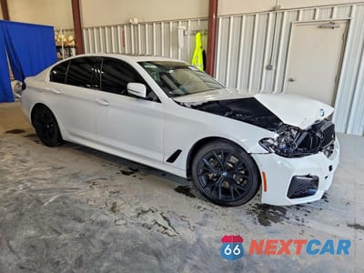 Czwarte zdjęcie samochodu z boku: 2022 BMW 530 XI VIN:WBA13BJ03NCJ40293 - miniatura