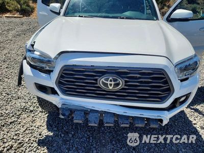 Zdjęcie 11 z 12 samochodu: 2021 TOYOTA TACOMA TRD OFF-ROAD VIN:3TMCZ5AN7MM441184 - miniatura