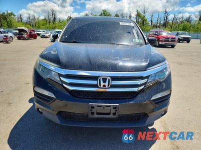 Piąte zdjęcie samochodu w środku: 2016 HONDA PILOT EXL VIN:5FNYF6H5XGB037962 - miniatura