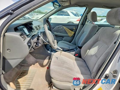 Zdjęcie 7 z 12 samochodu: 2001 TOYOTA CAMRY LE VIN:JT2BG28K010601635 - miniatura