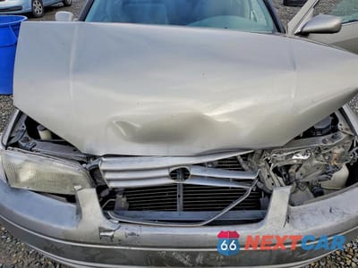Zdjęcie 11 z 12 samochodu: 1998 TOYOTA CAMRY LE VIN:JT2BG22K2W0130989 - miniatura