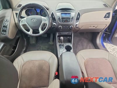 Zdjęcie 8 z 13 samochodu: 2013 HYUNDAI TUCSON VIN:KM8JUCAC5DU696349 - miniatura