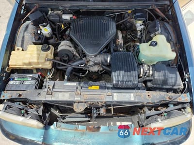 Zdjęcie 12 z 13 samochodu: 1995 BUICK ROADMASTER ESTATE VIN:1G4BR82P8SR416654 - miniatura