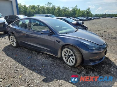 Czwarte zdjęcie samochodu z boku: 2023 TESLA MODEL 3 VIN:5YJ3E1EA7PF438354 - miniatura