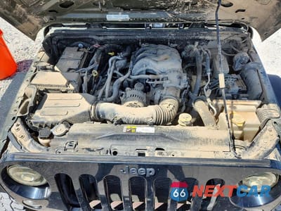 Zdjęcie 12 z 13 samochodu: 2016 JEEP WRANGLER SPORT VIN:1C4AJWAG8GL137258 - miniatura