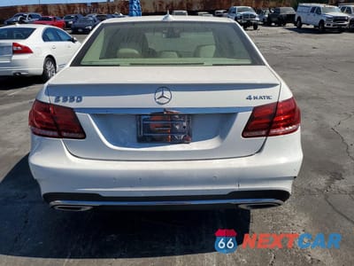 Zdjęcie 6 z 12 samochodu: 2014 MERCEDES-BENZ E 550 4MATIC VIN:WDDHF9BB6EA883162 - miniatura