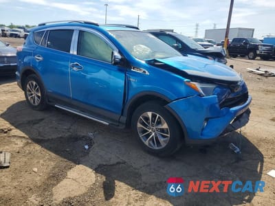 Czwarte zdjęcie samochodu z boku: 2016 TOYOTA RAV4 HV XLE VIN:JTMRJREVXGD057306 - miniatura