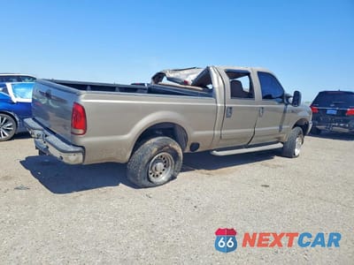 Trzecie zdjęcie samochodu z tyłu: 2002 FORD F250 SUPER DUTY VIN:1FTNW20F22EC74407 - miniatura