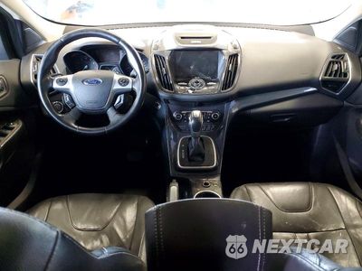 Zdjęcie 8 z 13 samochodu: 2013 FORD ESCAPE TITANIUM VIN:1FMCU0J95DUC45370 - miniatura