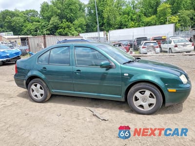 Czwarte zdjęcie samochodu z boku: 2002 VOLKSWAGEN JETTA GLS TDI VIN:3VWSP69M82M174845 - miniatura
