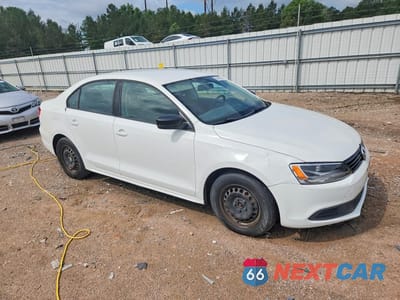Czwarte zdjęcie samochodu z boku: 2014 VOLKSWAGEN JETTA BASE VIN:3VW2K7AJ7EM409116 - miniatura