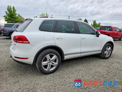 Trzecie zdjęcie samochodu z tyłu: 2013 VOLKSWAGEN TOUAREG V6 TDI VIN:WVGEP9BP0DD012188 - miniatura