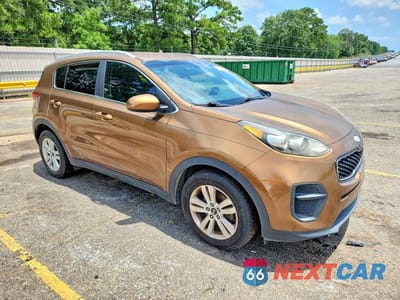 Czwarte zdjęcie samochodu z boku: 2017 KIA SPORTAGE LX VIN:KNDPM3AC2H7078974 - miniatura