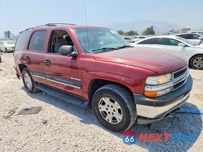 Czwarte zdjęcie samochodu z boku: 2002 CHEVROLET TAHOE K1500 VIN:1GNEK13Z52J333525 - miniatura