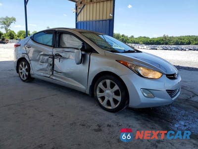 Czwarte zdjęcie samochodu z boku: 2012 HYUNDAI ELANTRA LIMITED VIN:KMHDH4AE9CU304979 - miniatura