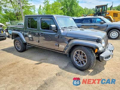 Czwarte zdjęcie samochodu z boku: 2023 JEEP GLADIATOR OVERLAND VIN:1C6HJTFG4PL514570 - miniatura