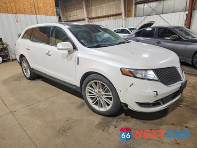 Czwarte zdjęcie samochodu z boku: 2013 LINCOLN MKT VIN:2LMHJ5AT2DBL57058 - miniatura