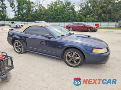 Czwarte zdjęcie samochodu z boku: 2001 FORD MUSTANG GT VIN:1FAFP45X91F189948 - miniatura