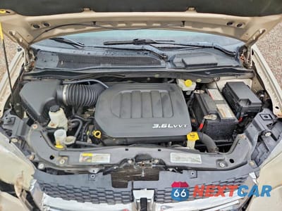 Zdjęcie 12 z 13 samochodu: 2013 DODGE GRAND CARAVAN SXT VIN:2C4RDGCG1DR759829 - miniatura