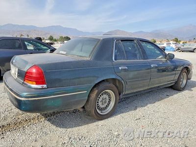 Trzecie zdjęcie samochodu z tyłu: 1998 FORD CROWN VICTORIA LX VIN:2FAFP74W1WX172857 - miniatura
