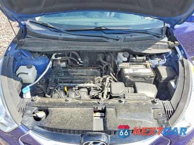 Zdjęcie 12 z 13 samochodu: 2013 HYUNDAI TUCSON LIMITED VIN:KM8JUCAC2DU581823 - miniatura