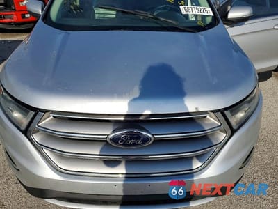 Zdjęcie 12 z 13 samochodu: 2018 FORD EDGE SEL VIN:2FMPK4J82JBB28403 - miniatura