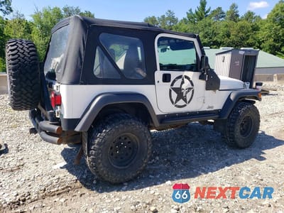 Trzecie zdjęcie samochodu z tyłu: 1998 JEEP WRANGLER VIN:1J4FY29P5WP765620 - miniatura