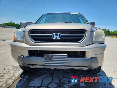 Piąte zdjęcie samochodu w środku: 2003 HONDA PILOT EX VIN:2HKYF18433H566241 - miniatura