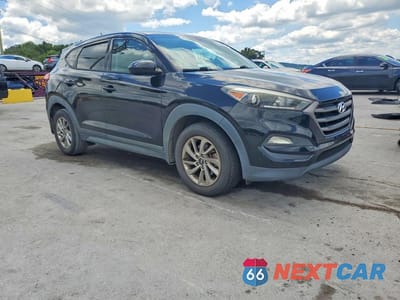 Czwarte zdjęcie samochodu z boku: 2016 HYUNDAI TUCSON SE VIN:KM8J23A46GU127528 - miniatura