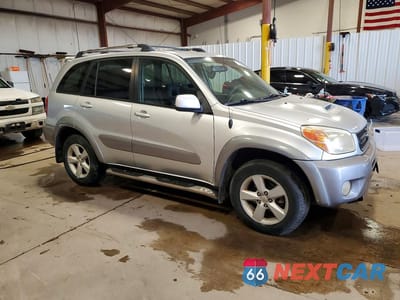 Czwarte zdjęcie samochodu z boku: 2004 TOYOTA RAV4 BASE VIN:JTEHD20VX46005607 - miniatura
