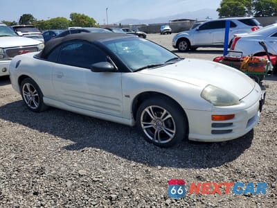 Czwarte zdjęcie samochodu z boku: 2002 MITSUBISHI ECLIPSE SPYDER GT VIN:4A3AE85H72E067748 - miniatura