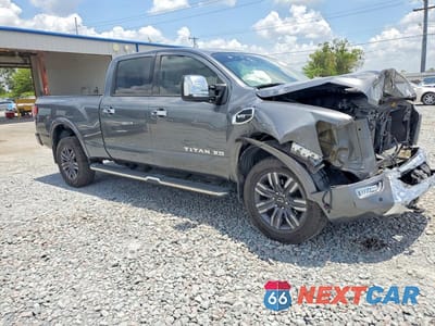 Czwarte zdjęcie samochodu z boku: 2023 NISSAN TITAN XD PLATINUM RESERVE VIN:1N6AA1FB4PN114691 - miniatura