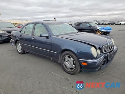 Czwarte zdjęcie samochodu z boku: 1998 MERCEDES-BENZ E 430 VIN:WDBJF70F9WA691966 - miniatura