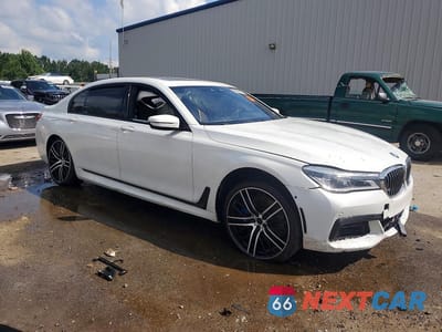 Czwarte zdjęcie samochodu z boku: 2016 BMW 750 I VIN:WBA7F0C59GGL99171 - miniatura