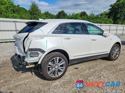 Trzecie zdjęcie samochodu z tyłu: 2024 CADILLAC XT5 PREMIUM LUXURY VIN:1GYKNCR48RZ727648 - miniatura
