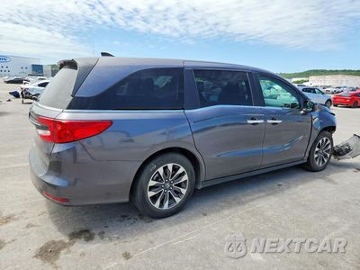 Trzecie zdjęcie samochodu z tyłu: 2021 HONDA ODYSSEY EXL VIN:5FNRL6H7XMB033999 - miniatura