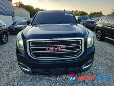 Piąte zdjęcie samochodu w środku: 2018 GMC YUKON XL C1500 SLT VIN:1GKS1GKC9JR262462 - miniatura