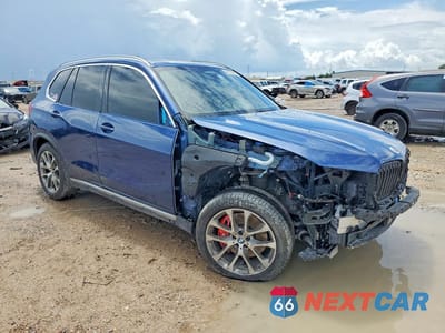 Czwarte zdjęcie samochodu z boku: 2022 BMW X5 XDRIVE45E VIN:5UXTA6C09N9K25785 - miniatura