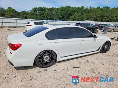 Trzecie zdjęcie samochodu z tyłu: 2016 BMW 740 I VIN:WBA7E2C59GG548029 - miniatura