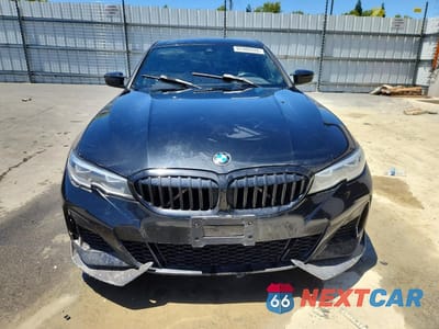 Piąte zdjęcie samochodu w środku: 2020 BMW M340I VIN:3MW5U7J02L8B23386 - miniatura