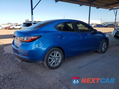 Trzecie zdjęcie samochodu z tyłu: 2016 SCION IA BASE VIN:3MYDLBZV4GY131663 - miniatura