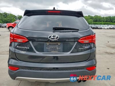 Zdjęcie 6 z 13 samochodu: 2013 HYUNDAI SANTA FE SPORT 2.0T VIN:5XYZW3LA1DG078444 - miniatura