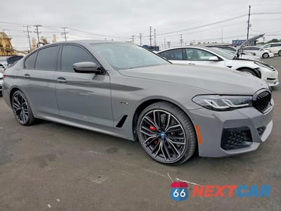 Czwarte zdjęcie samochodu z boku: 2022 BMW 530E VIN:WBA13AG07NCK61992 - miniatura